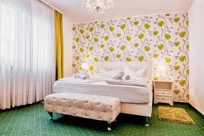 Ein Bett oder Betten in einem Zimmer der Unterkunft Hotel-Restaurant Central am Königshof