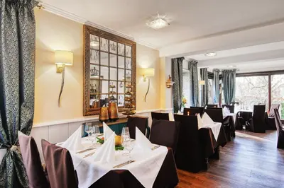 Ein Sitzbereich in der Unterkunft Hotel-Restaurant Central am Königshof