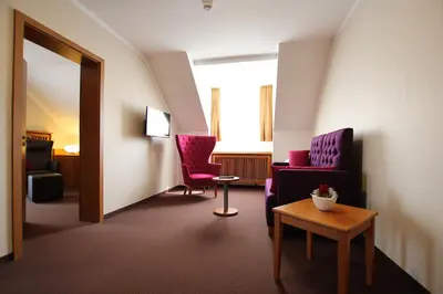 Ein Sitzbereich in der Unterkunft Hotel Straubs Schöne Aussicht