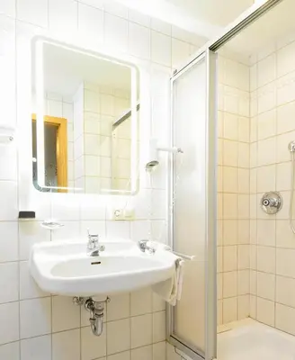 Ein Badezimmer in der Unterkunft Landgasthof Linkenmühle