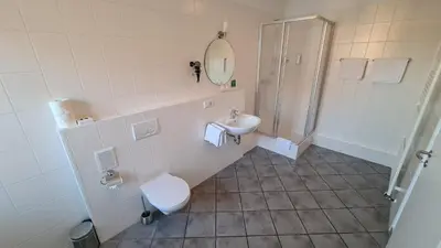 Ein Badezimmer in der Unterkunft Gasthof Schillereck