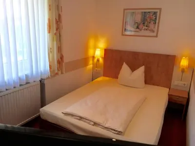 Ein Bett oder Betten in einem Zimmer der Unterkunft Hotel Ebnet