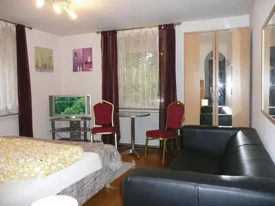 Ein Sitzbereich in der Unterkunft City Hotel