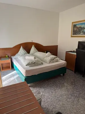 Ein Bett oder Betten in einem Zimmer der Unterkunft Hotel & Restaurant Garda