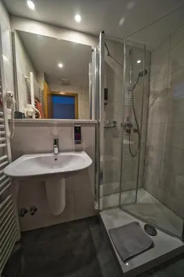 Ein Badezimmer in der Unterkunft Hotel Tenner