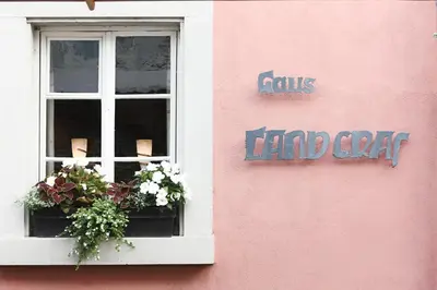Ein Zertifikat, Auszeichnung, Logo oder anderes Dokument, das in der Unterkunft Hotel Haus Landgraf ausgestellt ist
