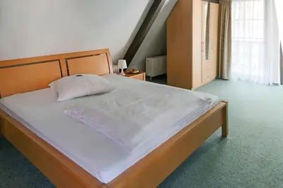 Ein Bett oder Betten in einem Zimmer der Unterkunft Doernersches Haus