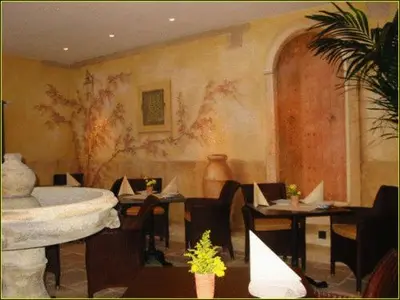 Ein Sitzbereich in der Unterkunft Hotel Villa Boddin