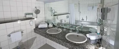 Ein Badezimmer in der Unterkunft Hotel Ambiente Walldorf