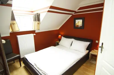 Ein Bett oder Betten in einem Zimmer der Unterkunft Die Dependance