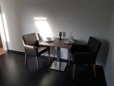 Ein Sitzbereich in der Unterkunft Hotel Langhans