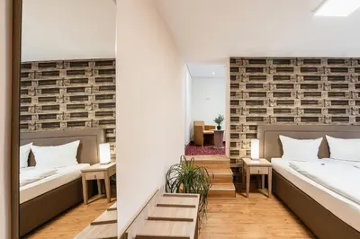 Ein Bett oder Betten in einem Zimmer der Unterkunft Hotel Altes Weinhaus