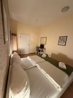 Ein Bett oder Betten in einem Zimmer der Unterkunft Hotel Deutscher Hof