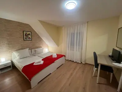Ein Bett oder Betten in einem Zimmer der Unterkunft Hotel Deutscher Hof