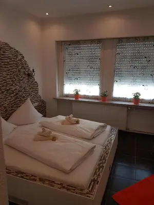 Ein Bett oder Betten in einem Zimmer der Unterkunft Hotel Schweizer Stubb