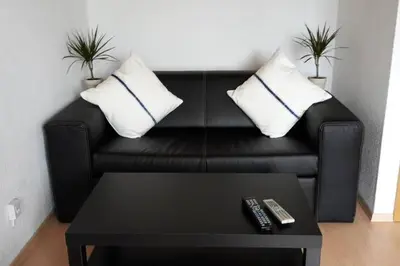 Ein Sitzbereich in der Unterkunft TLA Apartment with Garden
