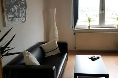 Ein Sitzbereich in der Unterkunft TLA Apartment with Garden