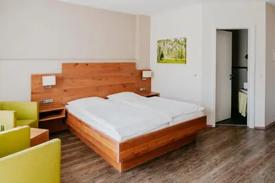 Ein Bett oder Betten in einem Zimmer der Unterkunft Hotel Birkenhof