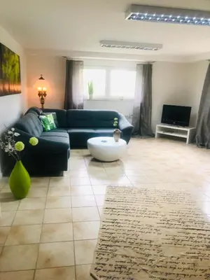 Ein Sitzbereich in der Unterkunft Ferienwohnung Feldmann