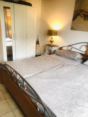 Ein Bett oder Betten in einem Zimmer der Unterkunft Ferienwohnung Feldmann
