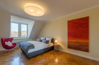 Ein Bett oder Betten in einem Zimmer der Unterkunft Zweite Heimat Heidelberg