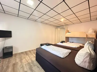 Ein Bett oder Betten in einem Zimmer der Unterkunft Looks Inn