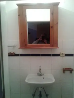 Ein Badezimmer in der Unterkunft Kleines Häuschen