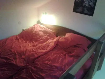 Ein Bett oder Betten in einem Zimmer der Unterkunft Kleines Häuschen