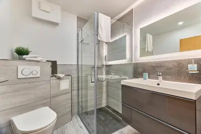 Ein Badezimmer in der Unterkunft Belisima Apartments I Ferienwohnungen Deidesheim I Deutsche Weinstraße I Individuell mit Charm I Ruhig am Kurpark I Nähe Supermarkt - Bäcker - Bahnhof