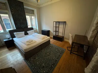 Ein Bett oder Betten in einem Zimmer der Unterkunft Zimmer in Kaiserslautern