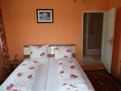 Ein Bett oder Betten in einem Zimmer der Unterkunft Gasthof und Pension Mainzer Rad
