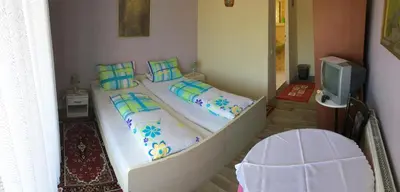 Ein Bett oder Betten in einem Zimmer der Unterkunft Gasthof und Pension Mainzer Rad