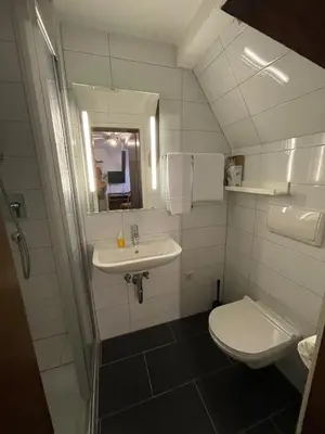 Ein Badezimmer in der Unterkunft Landhotel Sickinger Hof