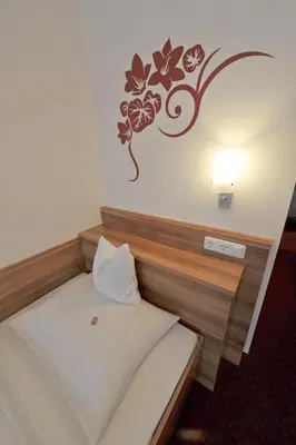 Ein Bett oder Betten in einem Zimmer der Unterkunft Hotel Nothnagel