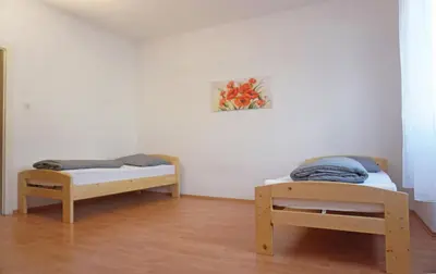 Ein Bett oder Betten in einem Zimmer der Unterkunft Ferienwohnung Bauknecht