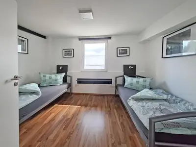 Ein Bett oder Betten in einem Zimmer der Unterkunft Loft-Unterkunft