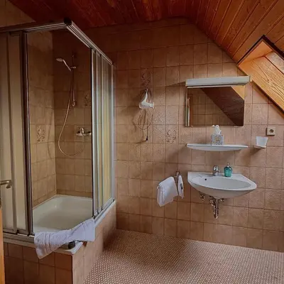 Ein Badezimmer in der Unterkunft Hotel Milú