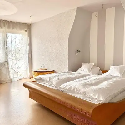 Ein Bett oder Betten in einem Zimmer der Unterkunft Hotel Milú