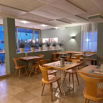 Ein Restaurant oder anderes Speiselokal in der Unterkunft Hotel Milú