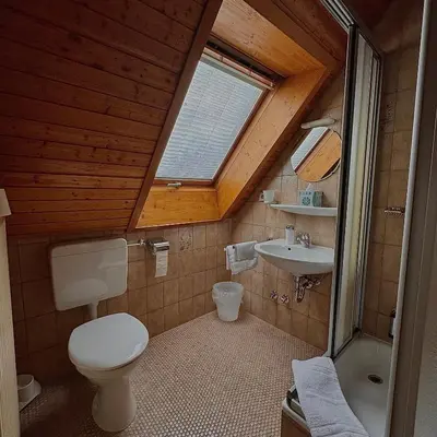 Ein Badezimmer in der Unterkunft Hotel Milú