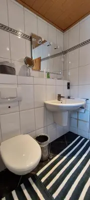 Ein Badezimmer in der Unterkunft Ferienwohnung Odenwaldblick