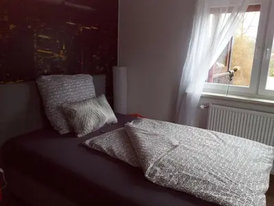 Ein Bett oder Betten in einem Zimmer der Unterkunft Landhotel Alte Mühle