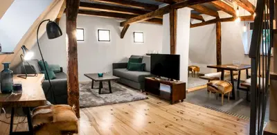 Ein Sitzbereich in der Unterkunft Ferienwohnung Stadtgarten