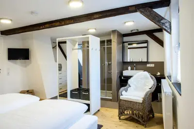 Ein Bett oder Betten in einem Zimmer der Unterkunft Ferienwohnung Stadtgarten