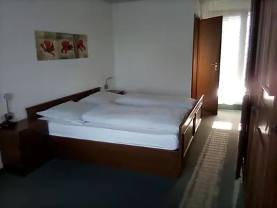 Ein Bett oder Betten in einem Zimmer der Unterkunft Gasthof Siller