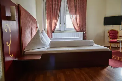 Ein Bett oder Betten in einem Zimmer der Unterkunft Hotel Riviera
