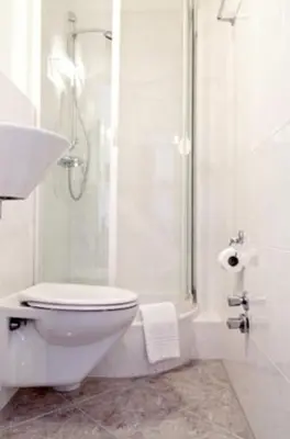 Ein Badezimmer in der Unterkunft Hotel Riviera