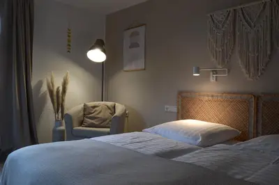 Ein Bett oder Betten in einem Zimmer der Unterkunft Pension Krone Sternenfels