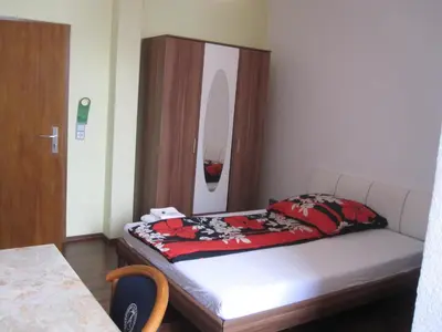 Ein Bett oder Betten in einem Zimmer der Unterkunft Hotel Feiertag