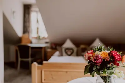 Ein Bett oder Betten in einem Zimmer der Unterkunft Hotel Zur alten Mühle